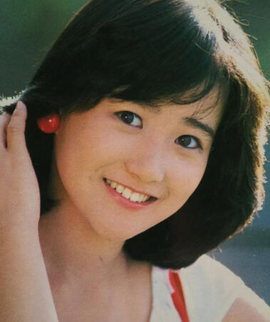 Singer Okada Yukiko. Click here for a 80s Japanese dance pop playlist!