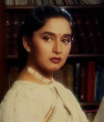 Actress Madhuri Dixit. Click here for a 80s-90s Bollywood Playlist!